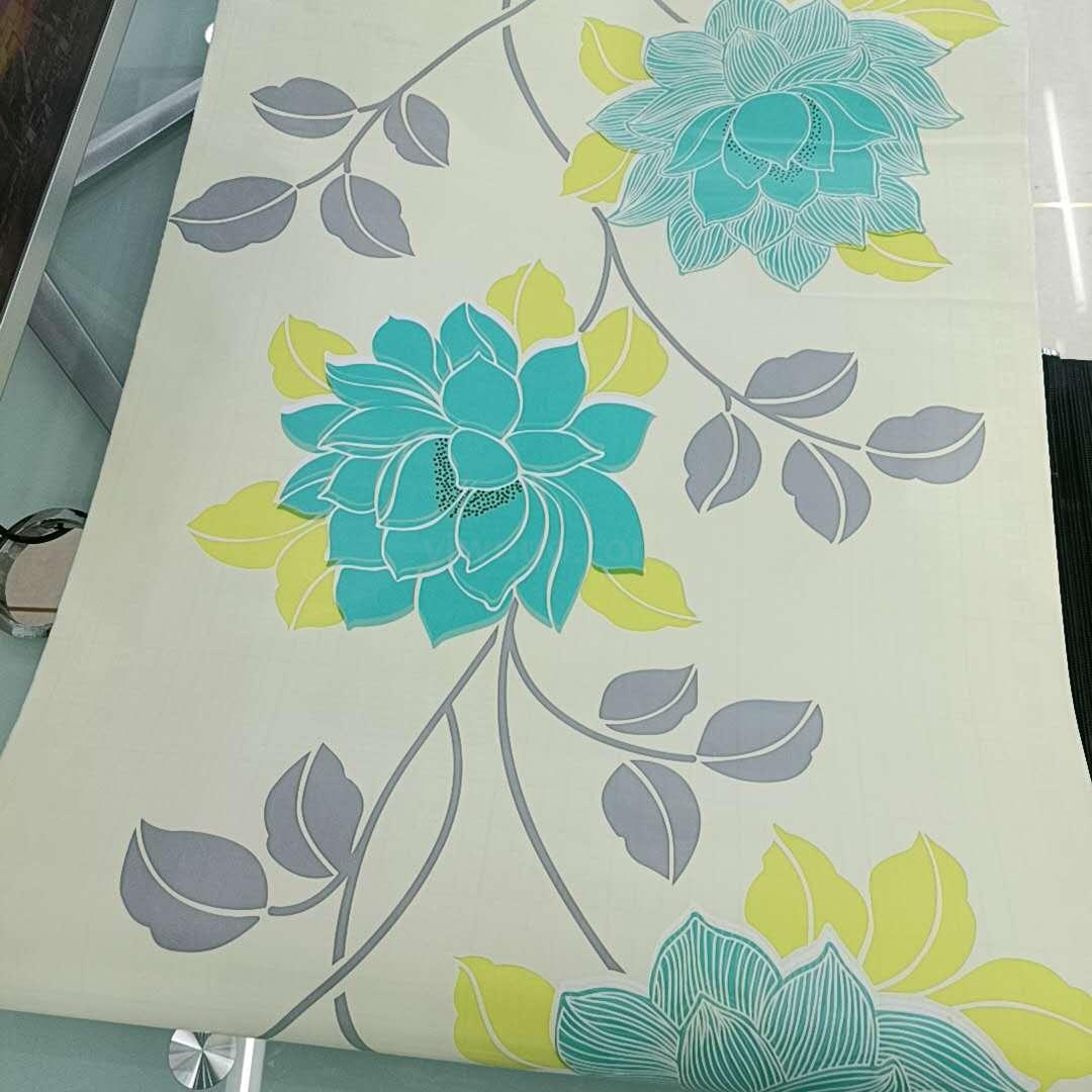 Fresh plants and flowers stick to the wall of the living roo...