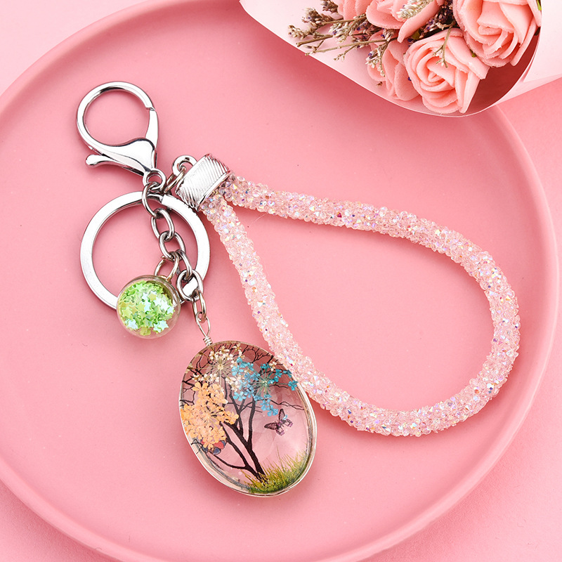 A glass Pendant is made by Creative Daystar, a dried flower plant keychain bag Accessories time gem