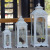 Factory Direct Sales European-Style Iron Retro Windproof Candle Holder Glass Barn Lantern Creative Romantic Storm Lantern Candlestick