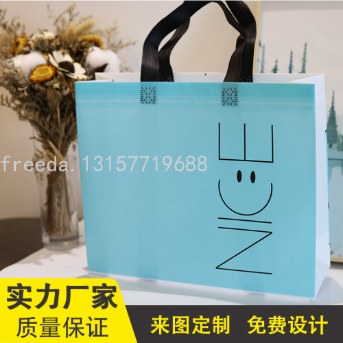 eco-friendly bag customized logo gift bag non-woven bag factory direct sales waterproof bag light blue smile style