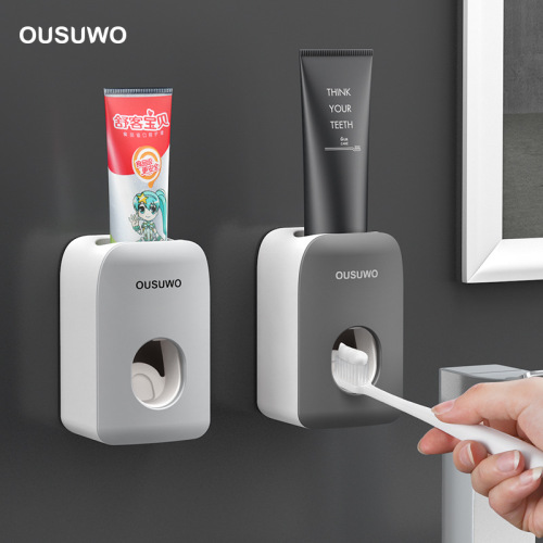 ousuwo squeeze toothpaste device wall-mounted toothpaste toothbrush holder set toothpaste holder lazy squeezer