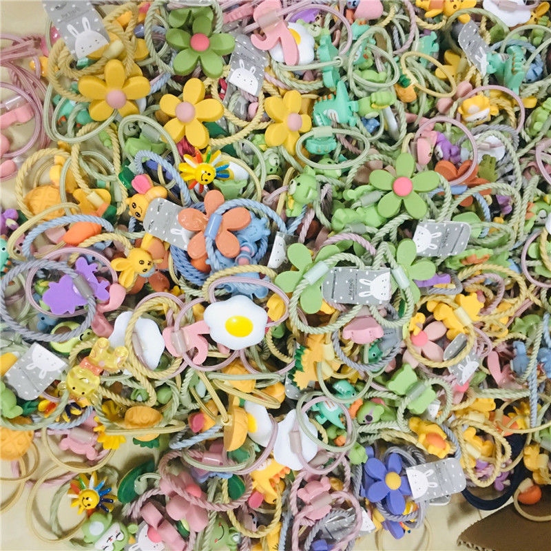 100 spread explosion children hair ring new hair rope Korean cartoon cute baby small rubber band headwear