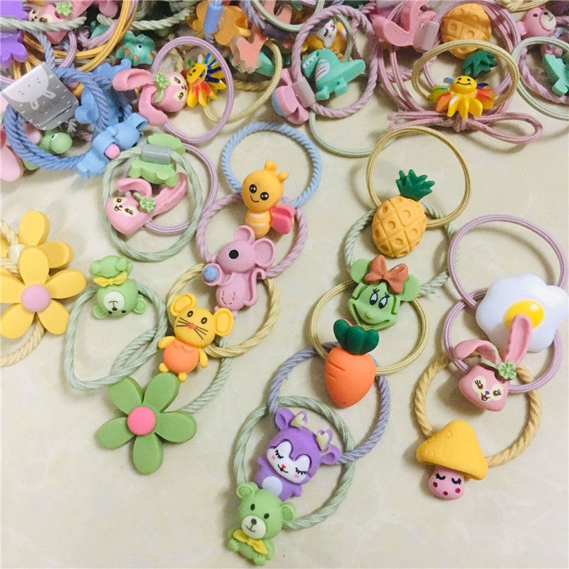 100 spread explosion children hair ring new hair rope Korean cartoon cute baby small rubber band headwear