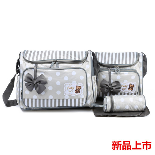 fashion printing large round point mummy bag four-piece set multi-functional large capacity one shoulder mother bag mother and baby supplies wholesale