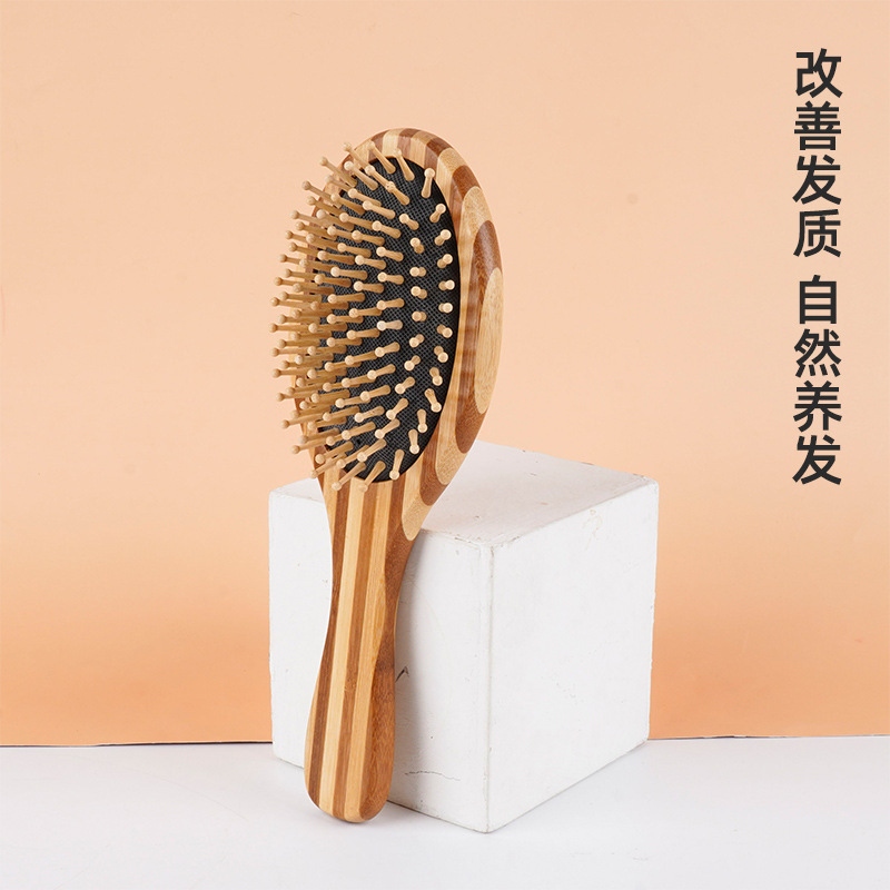 Ningbo factory produces air cushion massage comb bamboo flower and bamboo airbag Oval new wooden comb spot goods